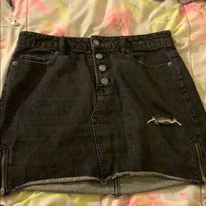 Distressed black denim skirt